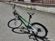 Vand bicicleta WOOM 4 (20") second-hand, verde