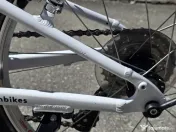 Vand bicicleta WOOM 4 (20") second-hand, verde