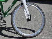 Vand bicicleta WOOM 4 (20") second-hand, verde