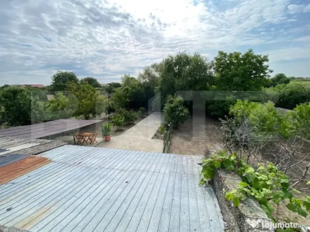 Teren 1464 mp cu casă locuibilă, front 26 mp, zona Ciarda