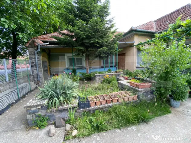 Teren 1464 mp cu casă locuibilă, front 26 mp, zona Ciarda