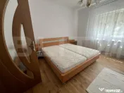 Casă de închiriat, 110 mp, 2 dormitoare, curte și parcare