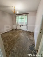 Apartament cu 2 camere la parter- nerenovat
