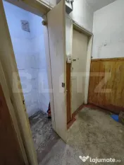 Apartament cu 2 camere la parter- nerenovat