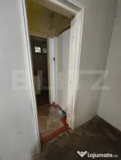 Apartament cu 2 camere la parter- nerenovat