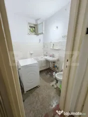 Apartament cu 2 camere la parter- nerenovat
