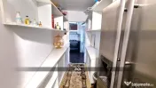 Apartament cu 3 camere si gradină de vânzare 