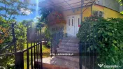 Apartament cu 3 camere si gradină de vânzare 