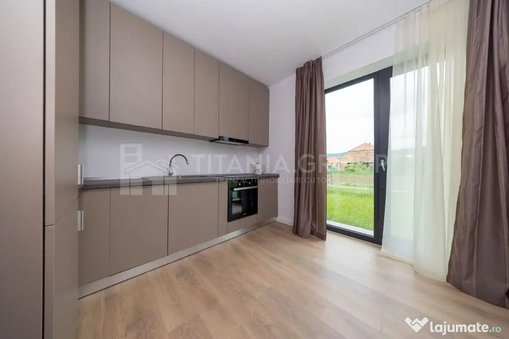 Casa individuala 4 camere, teren de 596 mp, partial mobil...