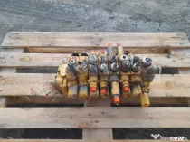 Distribuitor hidraulic Caterpillar 1943T30 buldoexcavator Caterpillar 428