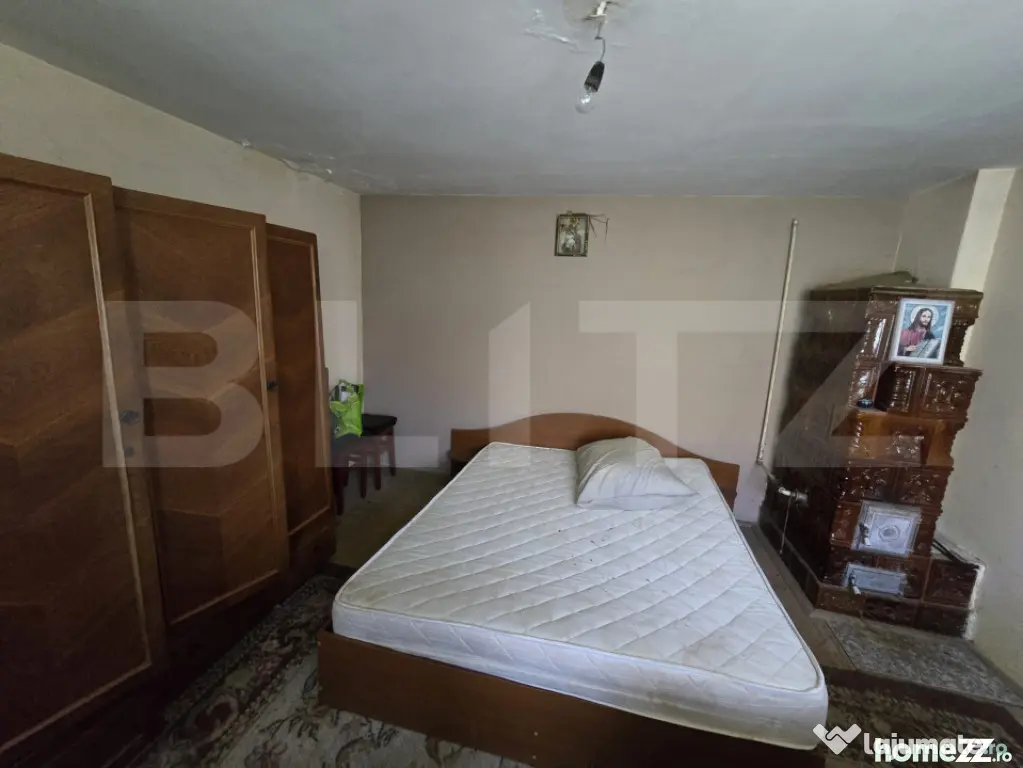 Casă 65 mp, teren de 1.500 mp, zona Titu
