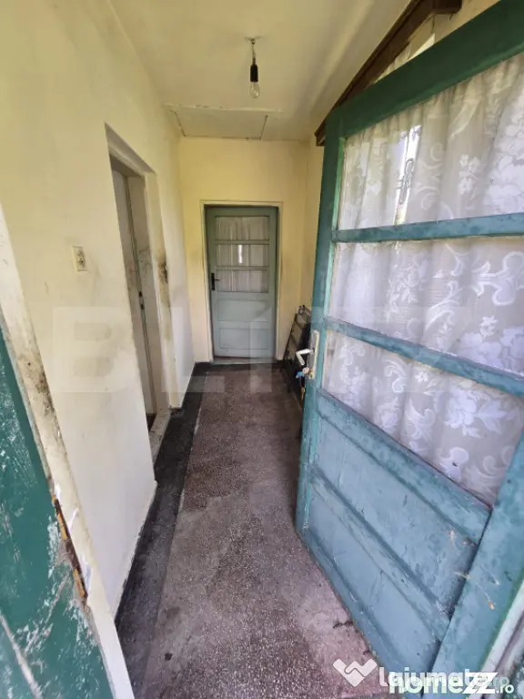 Casă 65 mp, teren de 1.500 mp, zona Titu