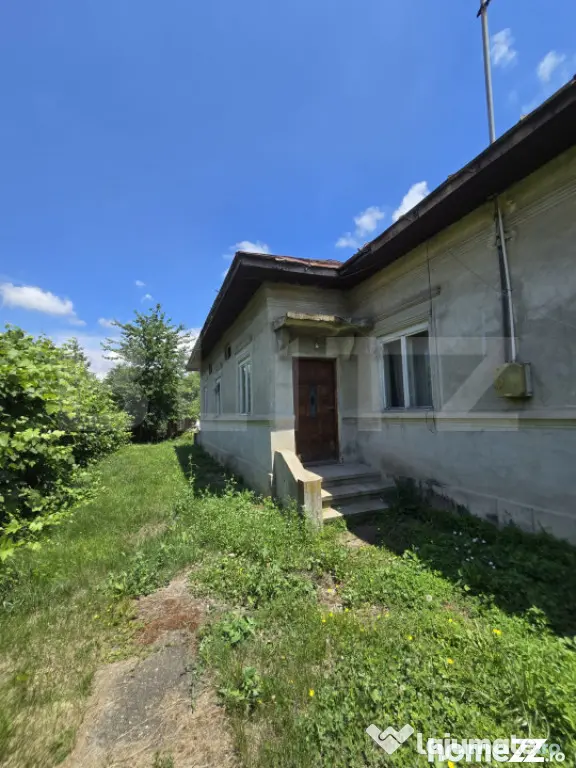 Casă 65 mp, teren de 1.500 mp, zona Titu