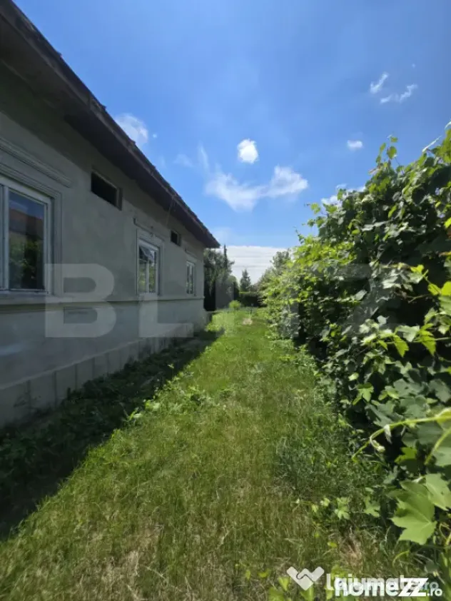 Casă 65 mp, teren de 1.500 mp, zona Titu