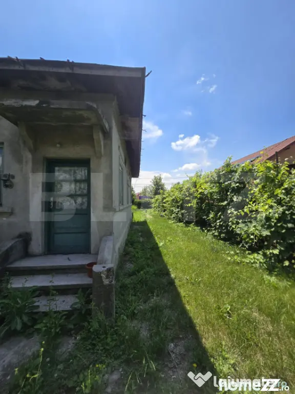 Casă 65 mp, teren de 1.500 mp, zona Titu