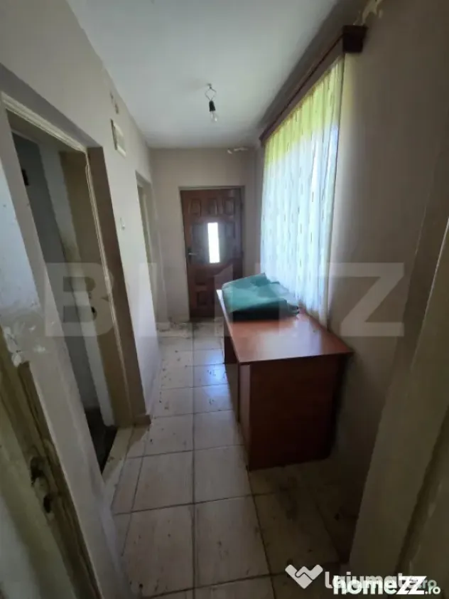 Casă 65 mp, teren de 1.500 mp, zona Titu