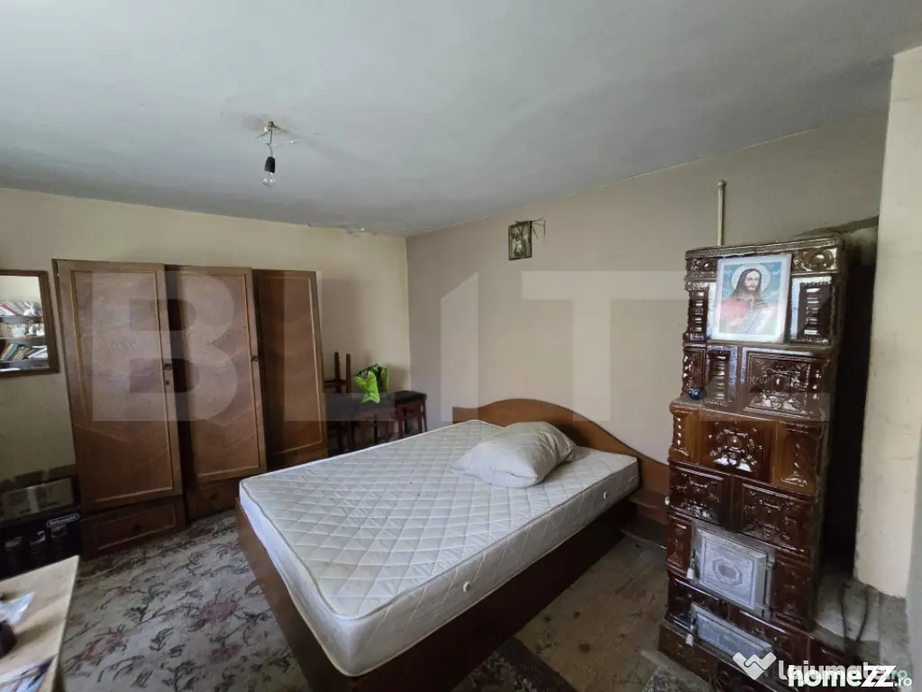 Casă 65 mp, teren de 1.500 mp, zona Titu