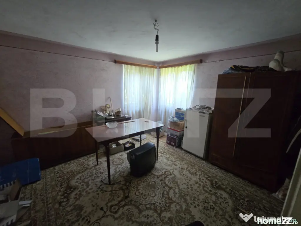 Casă 65 mp, teren de 1.500 mp, zona Titu