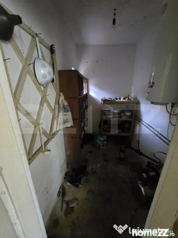 Casă 65 mp, teren de 1.500 mp, zona Titu