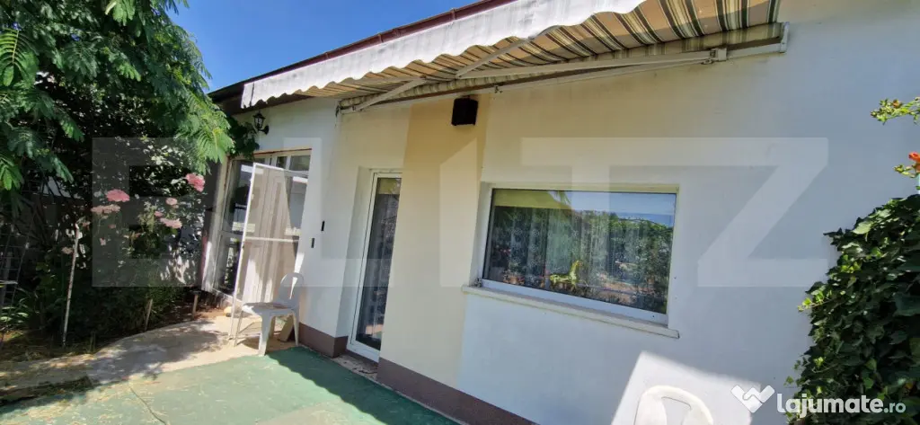 Casă cu teren generos de 905 mp, dublă deschidere – Piel