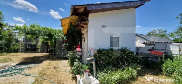 Casă cu teren generos de 905 mp, dublă deschidere – Piel
