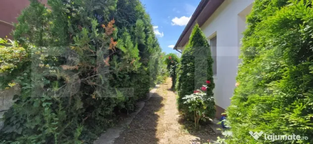 Casă cu teren generos de 905 mp, dublă deschidere – Piel