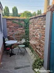 Apartament tip casa cu terasa si curte cu acces separat in M 