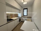 Apartament cu 2 camere, modern, loc de parcare– zona Într