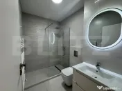 Apartament cu 2 camere, modern, loc de parcare– zona Într