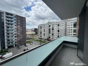 Apartament cu 2 camere, modern, loc de parcare– zona Într