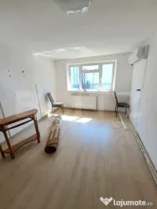 Casă spațioasă cu livadă, teren de 1.690 mp și panouri 