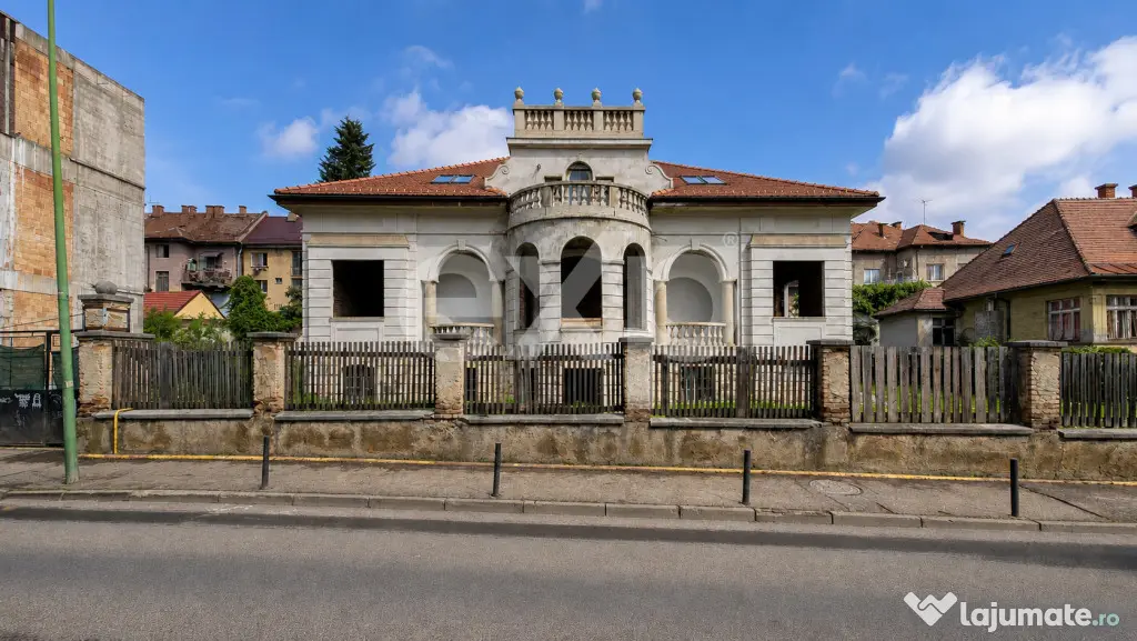 Casă cu arhitectură deosebită, 842 mp și teren de 1.048