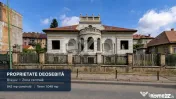 Casă cu arhitectură deosebită, 842 mp și teren de 1.048 