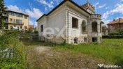 Casă cu arhitectură deosebită, 842 mp și teren de 1.048 
