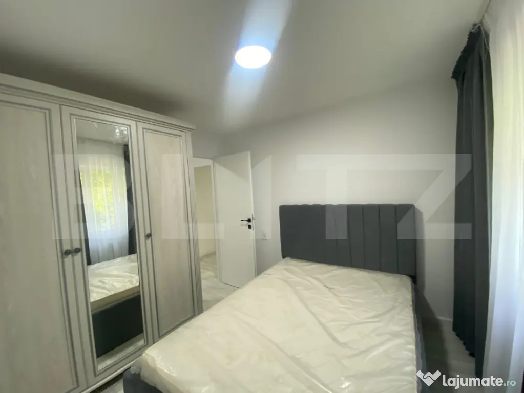 Apartament de inchiriat, cu 3 camere, 50 mp, gradina, modern