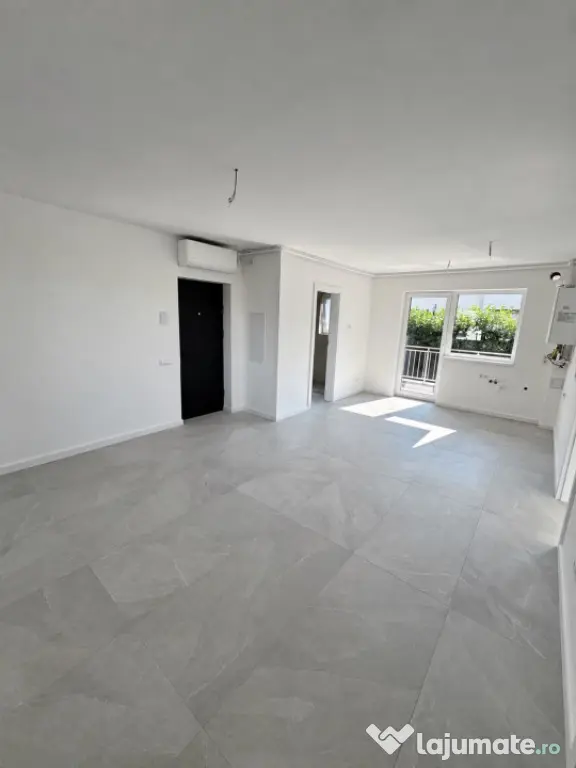 Apartament modern cu teren .Oportunitate excelentă pentru l