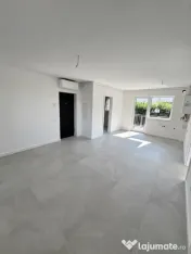 Apartament modern cu teren .Oportunitate excelentă pentru l 