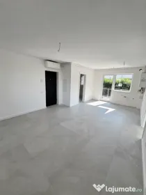 Apartament modern cu teren .Oportunitate excelentă pentru l