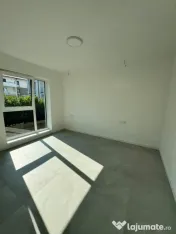 Apartament modern cu teren .Oportunitate excelentă pentru l 