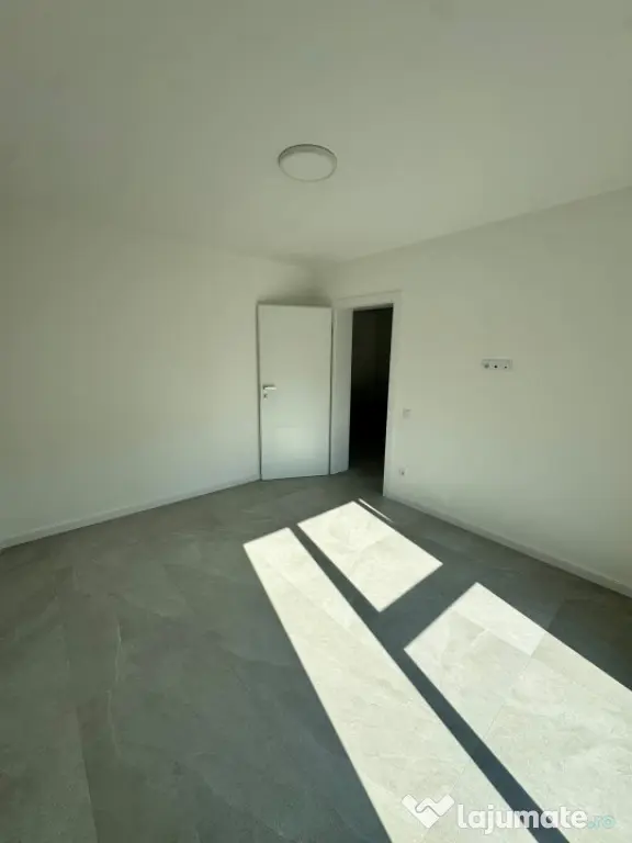 Apartament modern cu teren .Oportunitate excelentă pentru l
