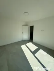 Apartament modern cu teren .Oportunitate excelentă pentru l 