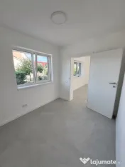 Apartament modern cu teren .Oportunitate excelentă pentru l 
