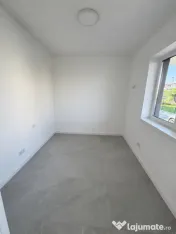 Apartament modern cu teren .Oportunitate excelentă pentru l 