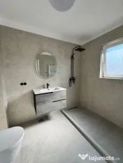 Apartament modern cu teren .Oportunitate excelentă pentru l 