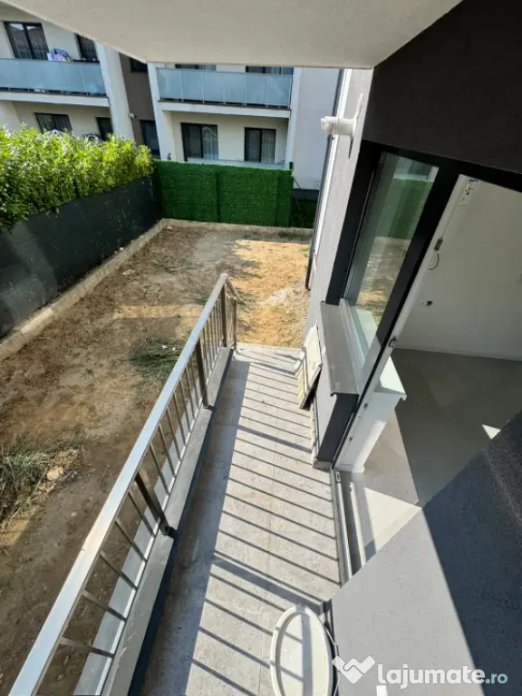 Apartament modern cu teren .Oportunitate excelentă pentru l