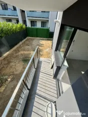 Apartament modern cu teren .Oportunitate excelentă pentru l 