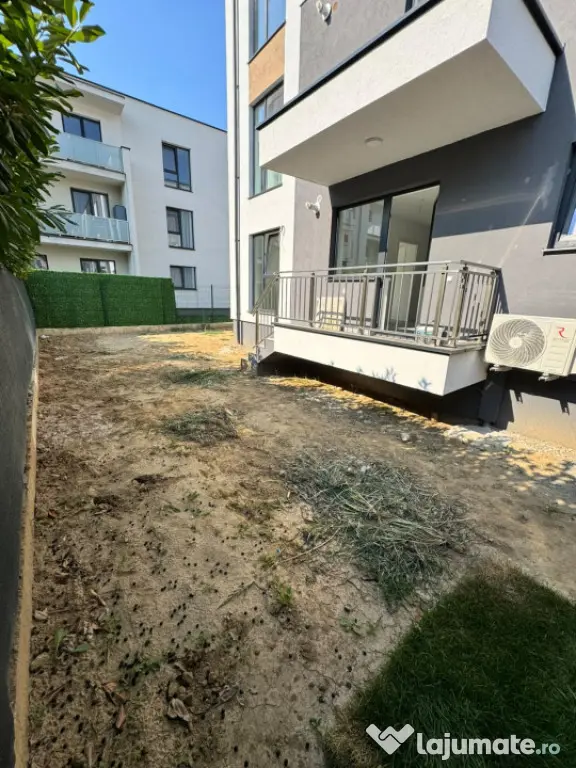 Apartament modern cu teren .Oportunitate excelentă pentru l
