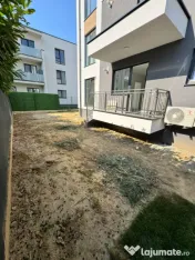 Apartament modern cu teren .Oportunitate excelentă pentru l 