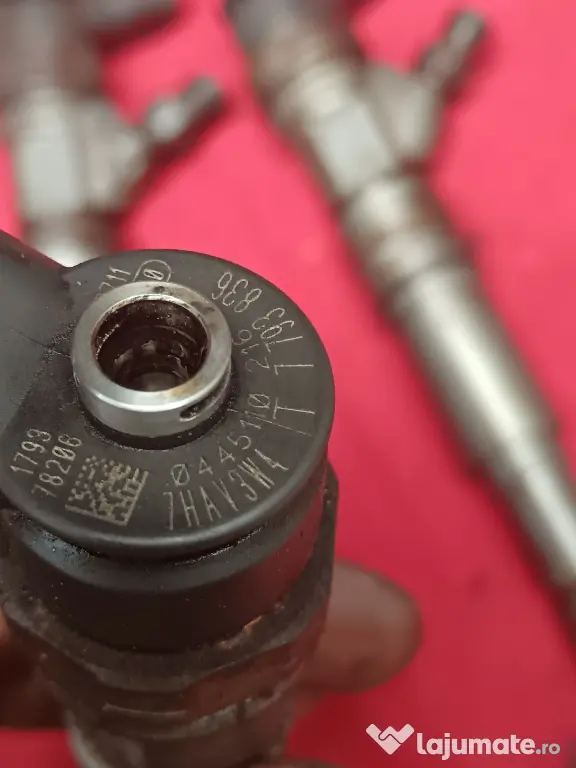 Injectoare bmw 2.0d