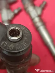 Injectoare bmw 2.0d 